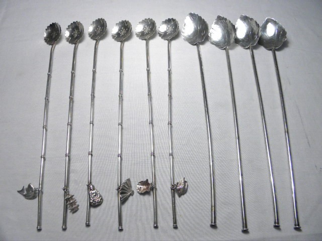 Sterling silver iced tea straw spoons.