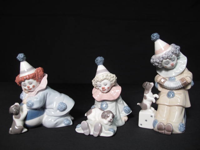 Three Lladro porcelain clowns each