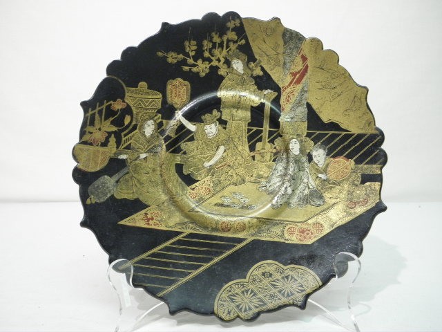 Chinoiserie black lacquer plate.