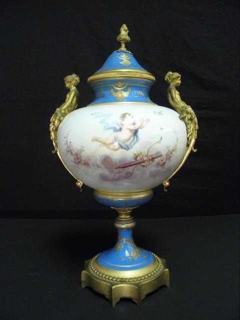 Porcelain hand painted covered urn with