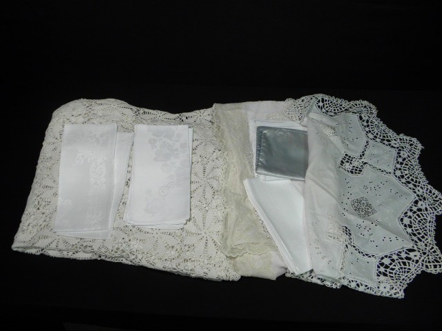 Group lot of assorted linens. Includes
