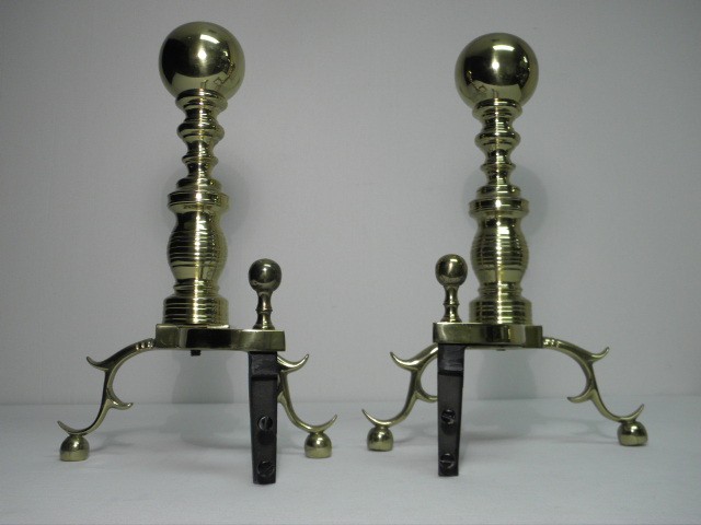 Pair of The Harvin Co brass andirons.