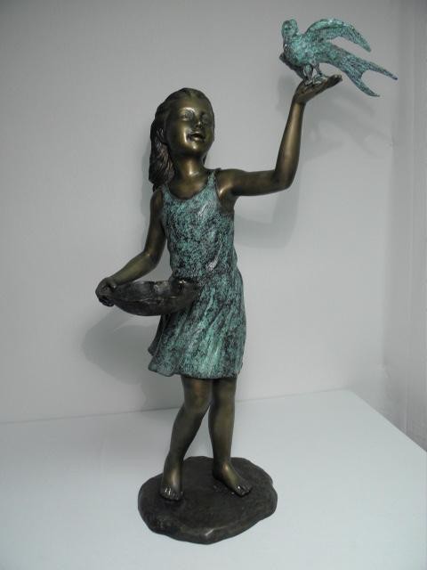 Bronze sculpture depicting a girl with