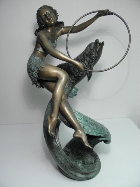 Bronze fountain in the form of a girl