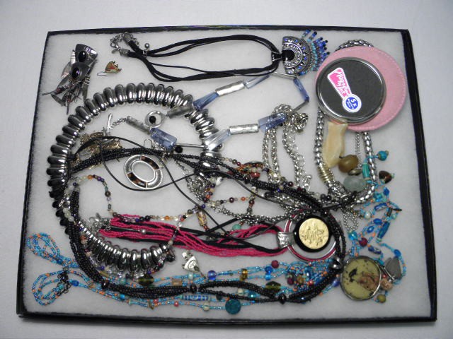 Lot of assorted ladies costume jewelry.