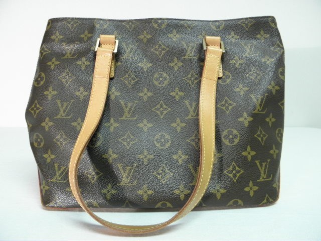 Louis Vuitton brown leather handbag.