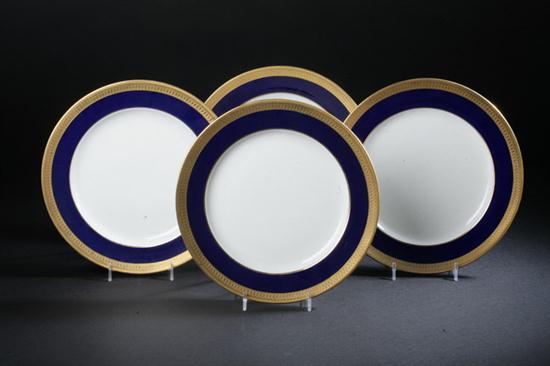 EIGHT MINTONS BONE CHINA DINNER PLATES.