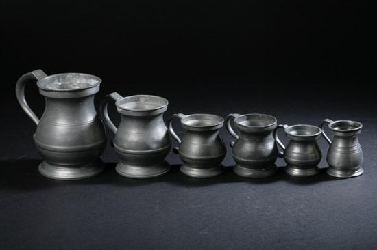 SIX ENGLISH PEWTER SPIRIT MEASURES