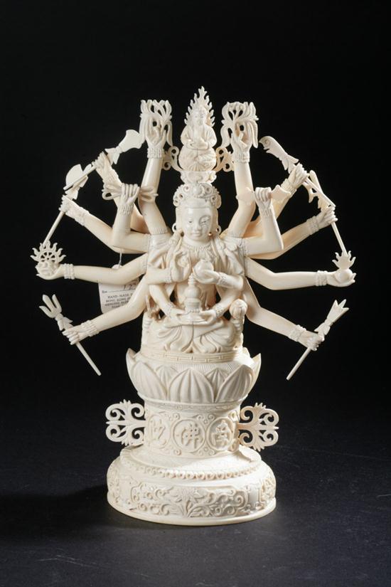 CHINESE IVORY FIGURE OF MULTI-ARM