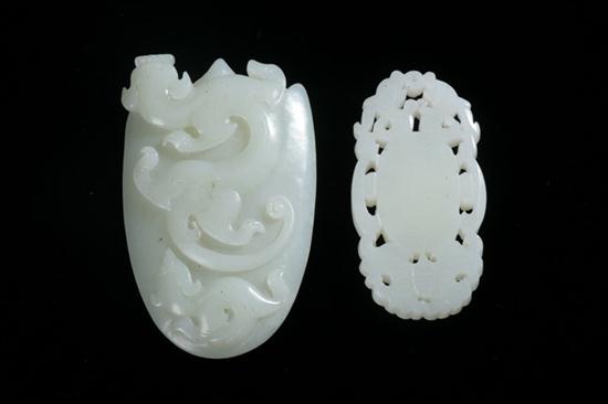 TWO CHINESE CELADON JADE CARVINGS. Carved