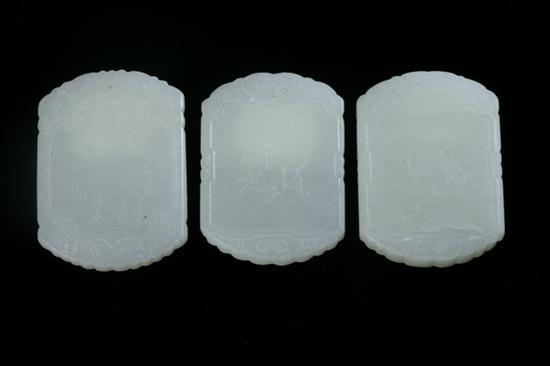 THREE CHINESE CELADON JADE PENDANTS  16d6bd