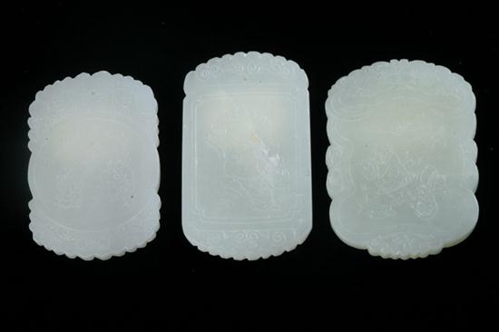 THREE CHINESE CELADON JADE PENDANTS  16d6be