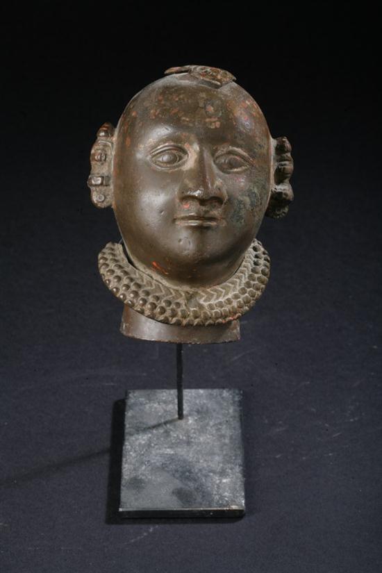 INDIAN BRONZE HEAD OF DEITY. -