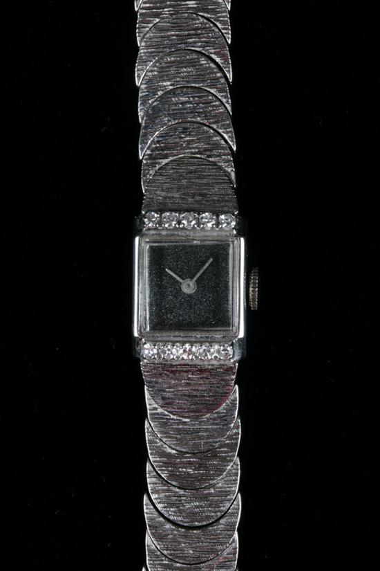 LADYS 14K WHITE GOLD AND DIAMOND WRISTWATCH.