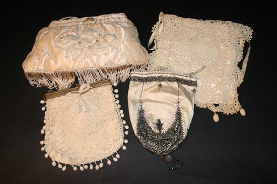 FOUR VINTAGE CREAM COLORED PURSES.