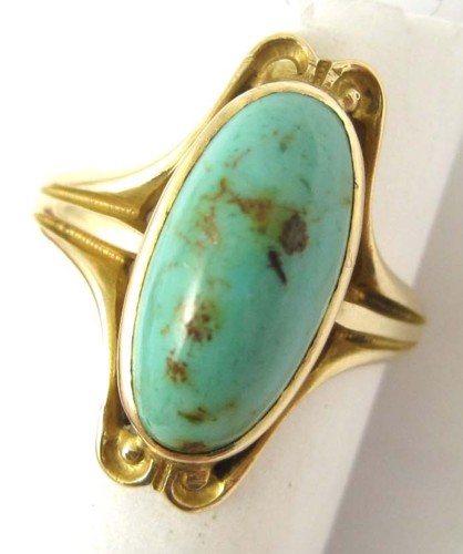 TURQUOISE AND FOURTEEN KARAT GOLD RING