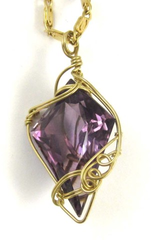 AMETHYST AND FOURTEEN KARAT GOLD