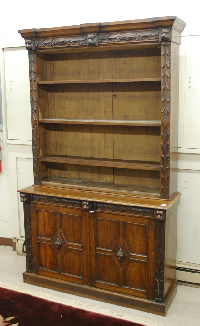 RELIEF CARVED OAK BOOKCASE ON CABINET 16ddac