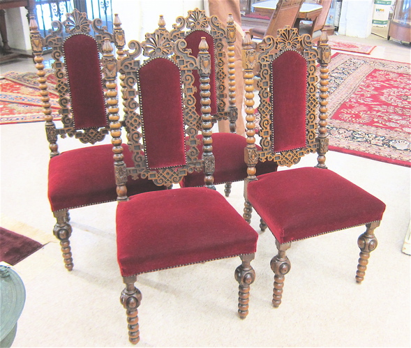 A SET OF FOUR CARVED AND UPHOLSTERED 16dded
