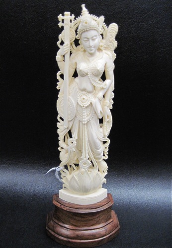 IVORY CARVED FEMALE FIGURE standing