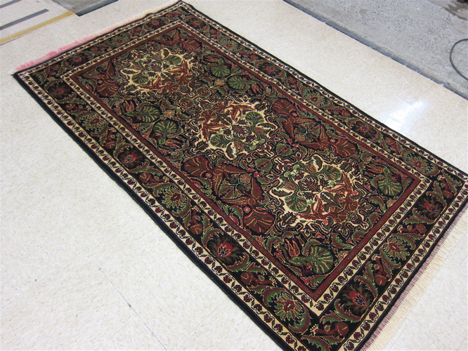 AN ORIENTAL AREA RUG hand woven 16debd