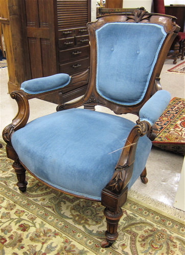 A VICTORIAN WALNUT ARMCHAIR Louis