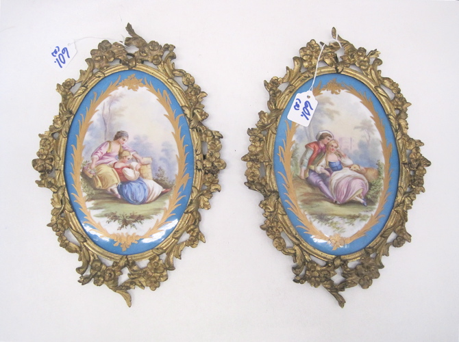 PAIR FRENCH GILT METAL WALL PLAQUES