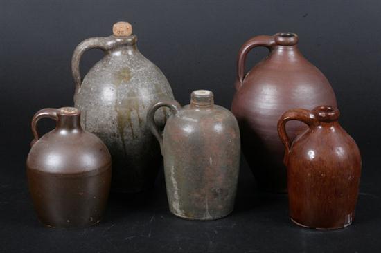 FIVE AMERICAN STONEWARE JUGS. -