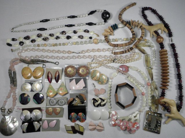 Tray lot of assorted costume jewelry.