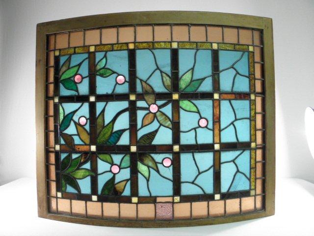Leaded stained and jeweled glass window.