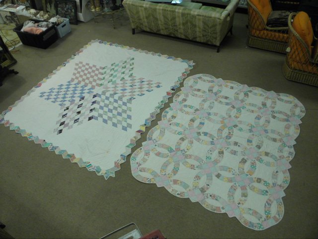 Two handmade patchwork quilts.