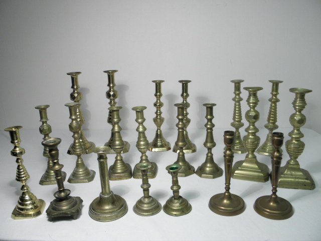 Lot of assorted early brass candle sticks