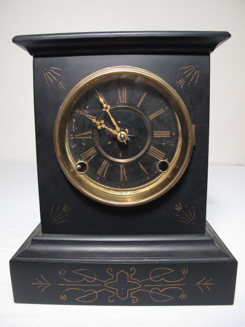 A French black marble mantle clock