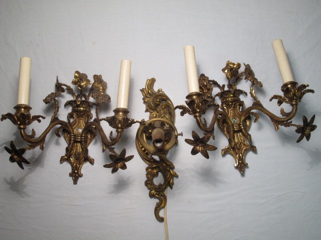 Two electrified cast brass sconces