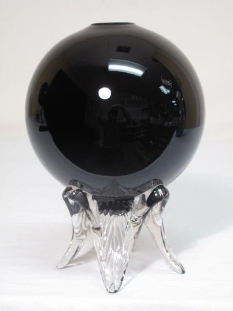 Art glass footed orb vase. Black round