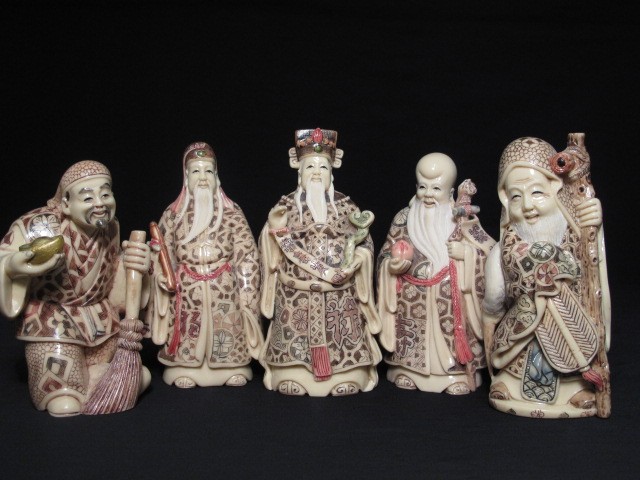 Large faux ivory figurines. 5 pieces