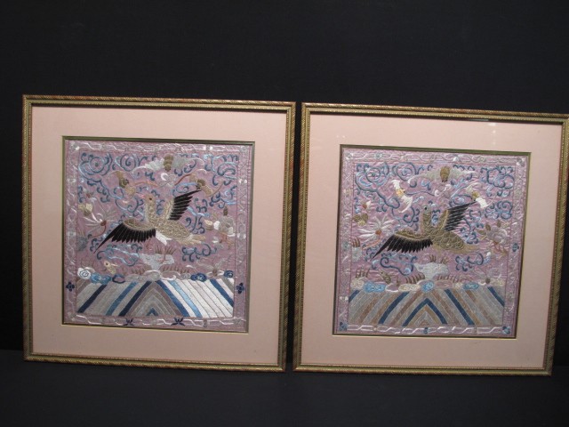 Two framed Chinese silk badges