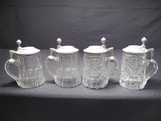 Four cut crystal & pewter steins. Condition: