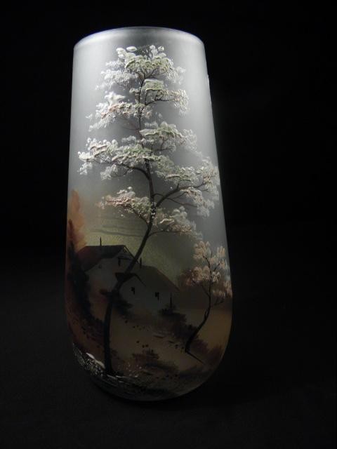 An enameled art glass vase with