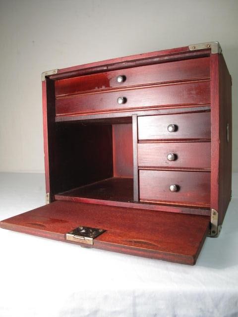 Wooden antique miniature cabinet.