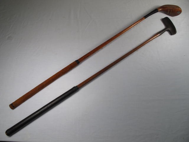Lot of two vintage wooden shafted clubs.