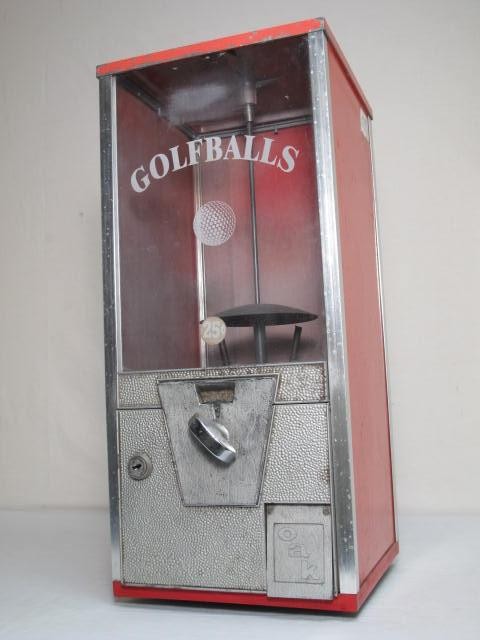 Vintage 25 cent golf ball dispenser.