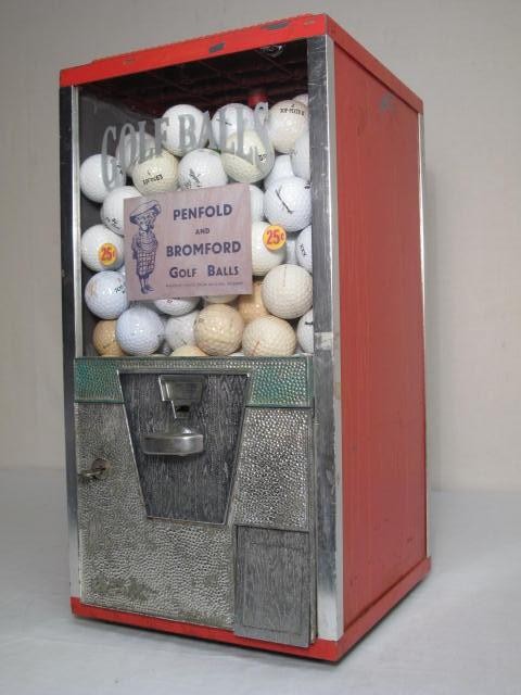 Vintage 25 cent golf ball dispenser.