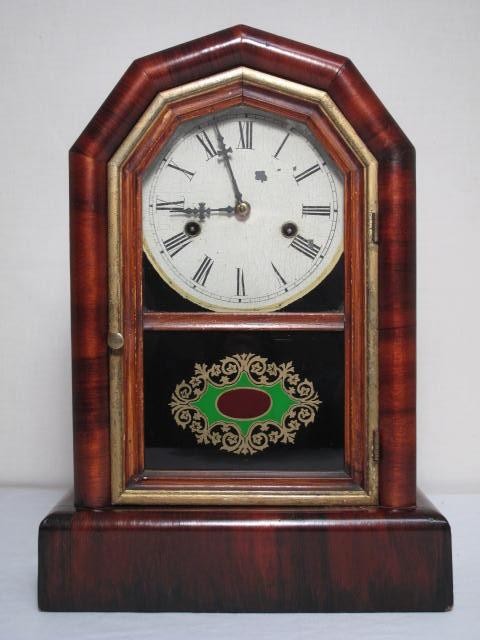 New Haven mahogany striking shelf clock.