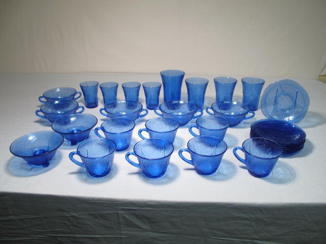 Cobalt blue glass dinnerware set.