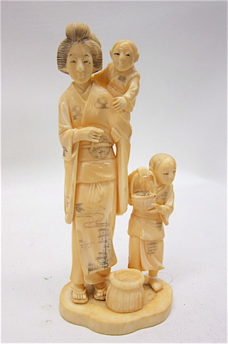 JAPANESE IVORY FIGURAL GROUP: mother