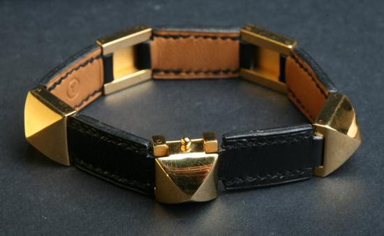 HERM?S BLACK LEATHER AND GOLD PLATED