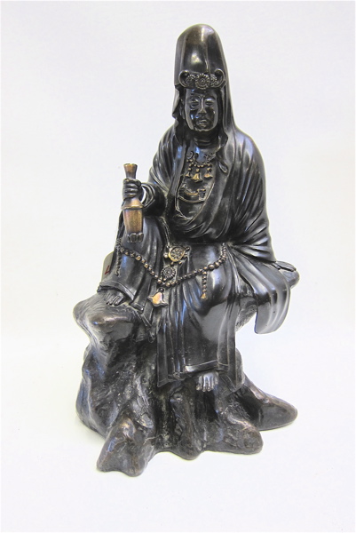 CHINESE BRONZE FIGURE depicting a well-to-do