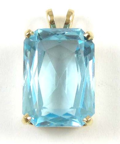 BLUE TOPAZ AND FOURTEEN KARAT GOLD PENDANT