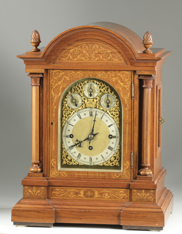 AN INLAID WALNUT CHIMING BRACKET CLOCK